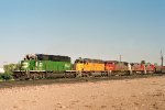 Burlington Northern SD40-2 #6833 leads a westbound past the depot 